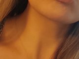 Sweetmarav (35, White Cam Girl) performing blowjob.