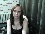 Sona (30, White Cam Girl) performing double penetration.