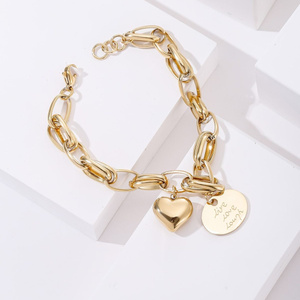 gold bracelet with heart pendant