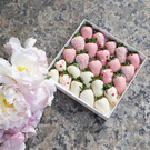 chocolate-covered strawberries or flowers
