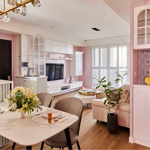 Buy a lovely pink apartment.