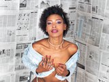 Anniesanz (20, Black Cam Girl) performing deepthroat.