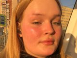 Anhedona (21, White Trans Model) performing blowjob.
