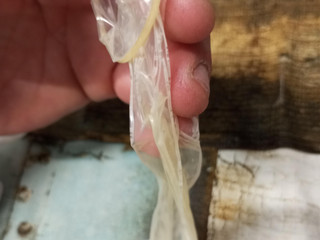 Condon lleno de leche