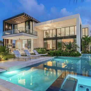a mansion with a dock