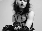 Lurosmodasy (24, White Trans Model) performing deepthroat.