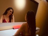 Samantamilff (47, Hispanic Cam Girl) performing blowjob.