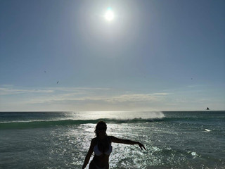 on the beach like that, but topless