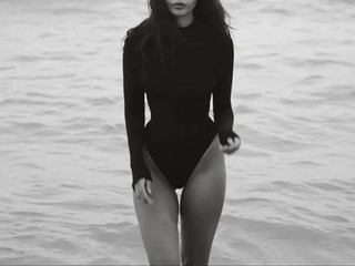 In a beautiful bodysuit