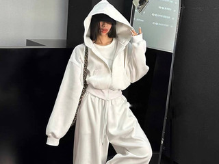 In a white tracksuit