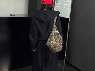 In a black tracksuit