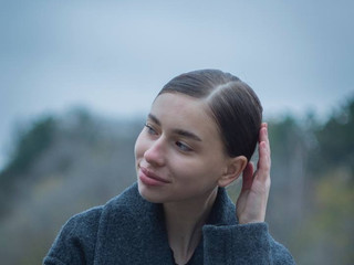 Under a tree in the park
