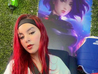 Flexible body of a red wrestler awaiting combat.