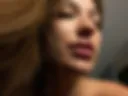 Zoom in her face