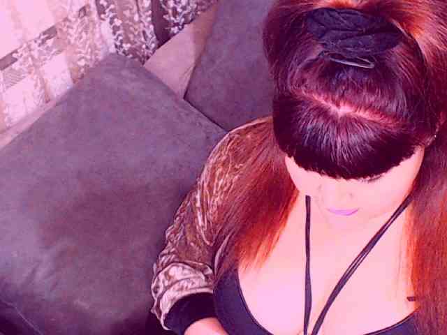 RedBustyX webcam