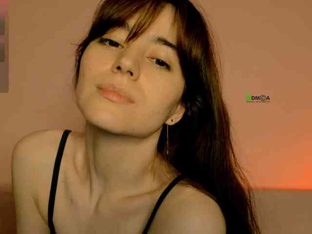 Fatal (29, White Cam Girl) performing blowjob.