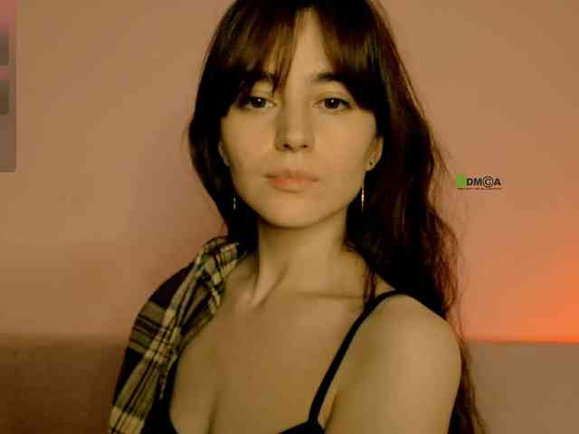 Fatal (29, White Cam Girl) performing blowjob.