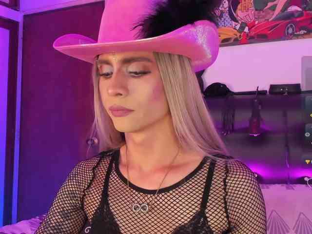 Angelsjones (25, Hispanic Trans Model) performing deepthroat.