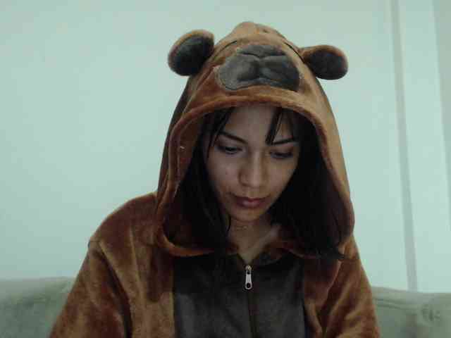 Ccolli (21, Hispanic Cam Girl) performing deepthroat.
