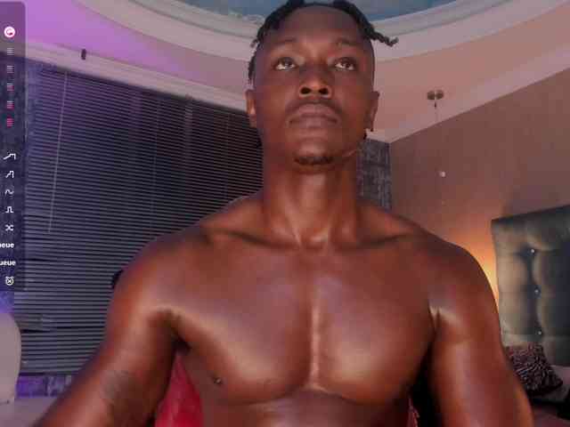 Dannsmmith (25, Black Cam Boy) performing blowjob.