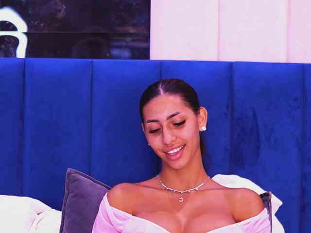 Marisad (22, White Cam Girl) performing deepthroat.