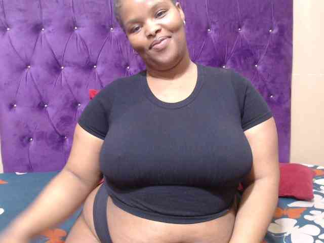 Massivass (23, Black Cam Girl) performing deepthroat.