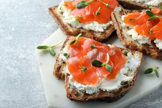 A sandwich with red fish